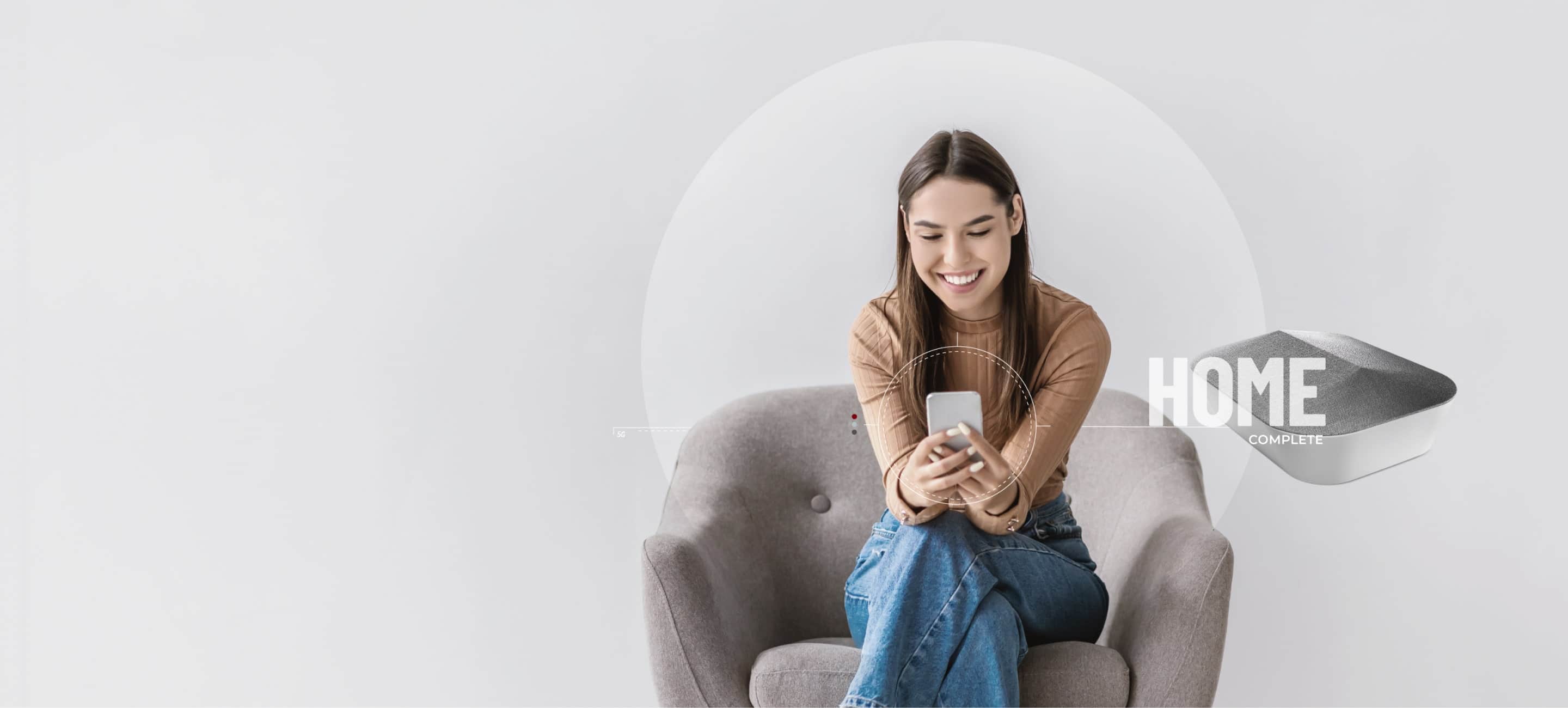 woman on couch holding phone