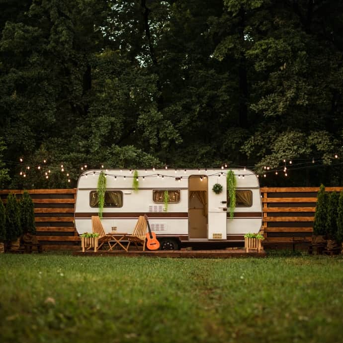 family eating outside rv