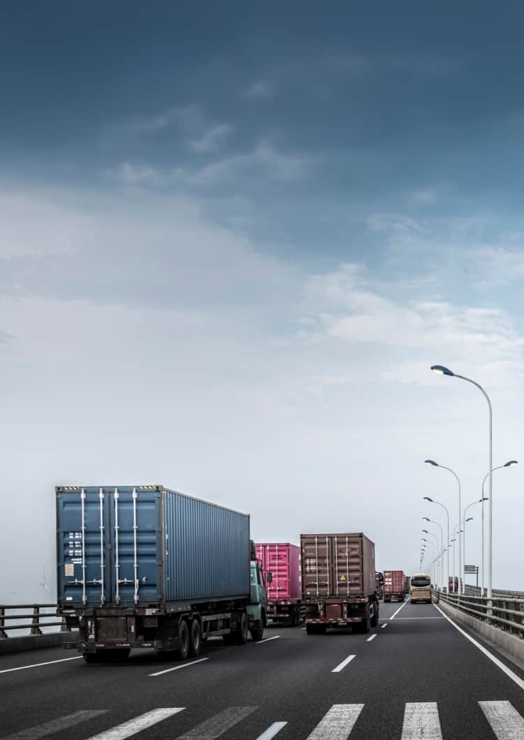 semi trucks on busy road