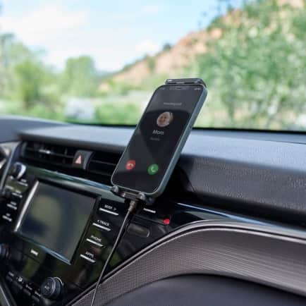 phone mounted on dash cradle