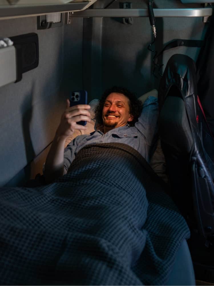 trucker using phone at night